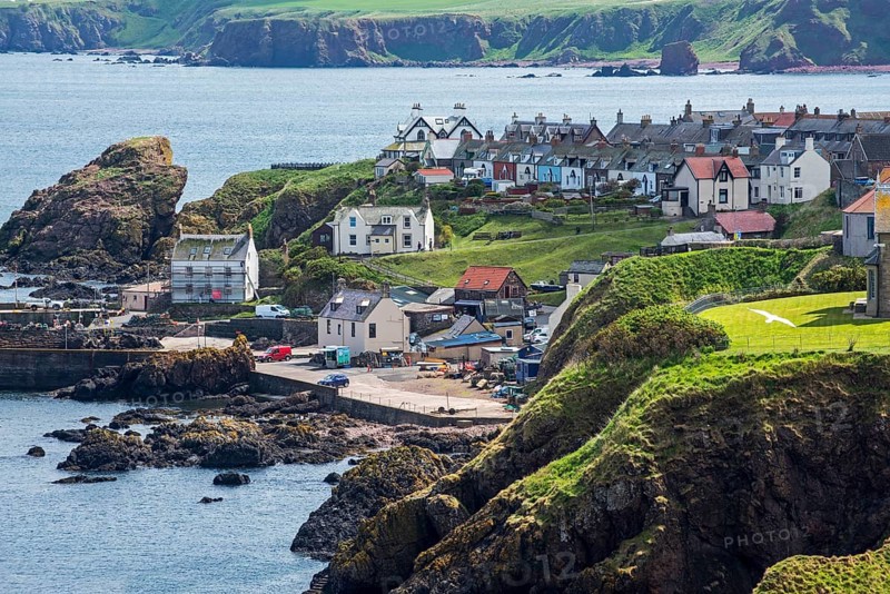 The fishing village of St Abbs seen from the south side of St Abb's Head