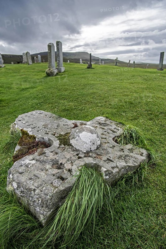 Old broken off Celtic cross on the Kilmuir Cemetery