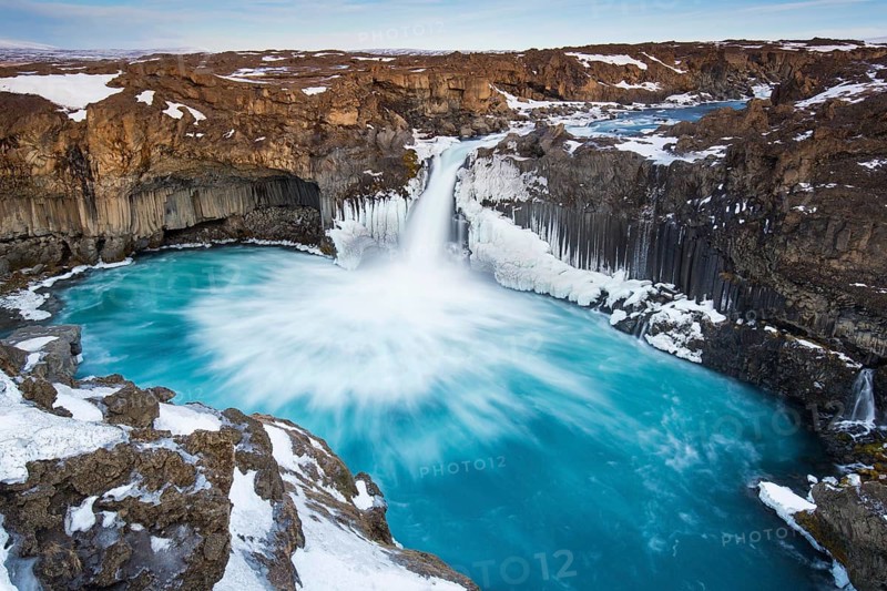 Aldeyjarfoss waterfall by the SkjsslfandafljÂ¾t river in winter in the north-eastern region