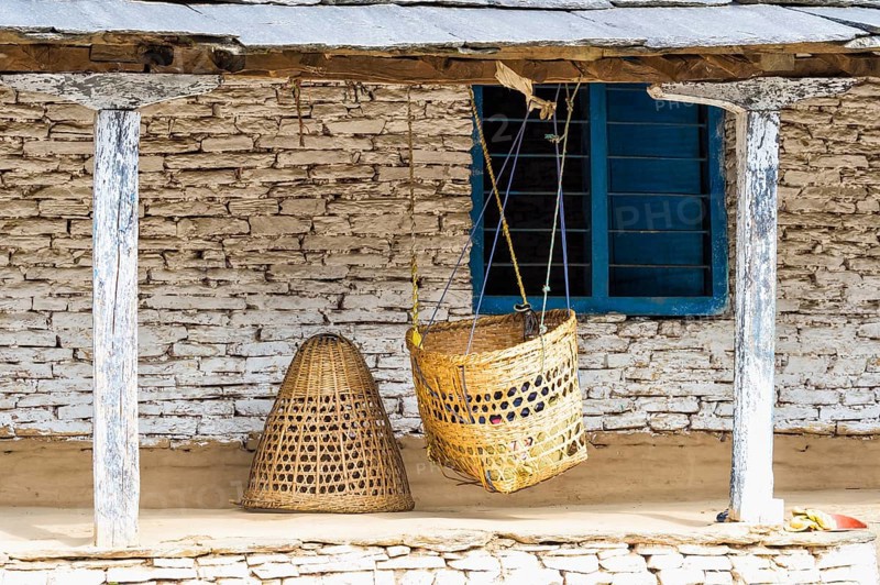 Cradle hanging in front of a house