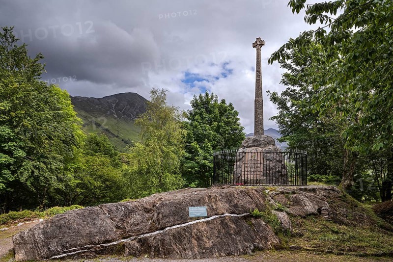 Monument with Celtic cross commemorating the massacre of the Clan MacDonald of Glencoe in 1692