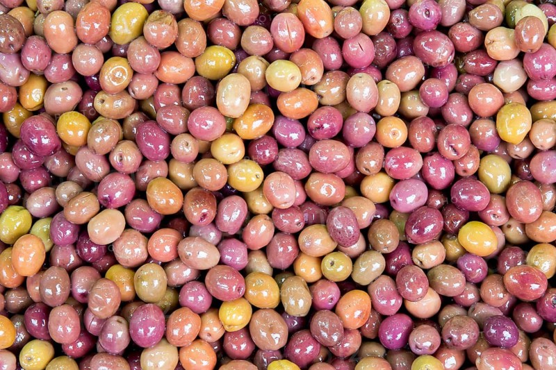 Macro view of olives as background in spice bazaar