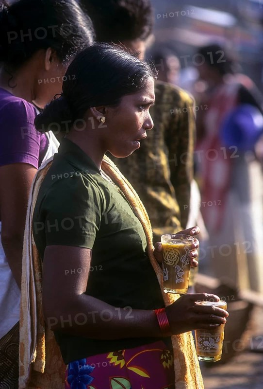 A woman tea server in Vizhinjam