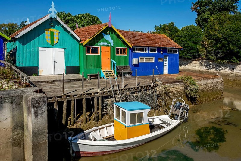 Colourful cabins oyster farmers