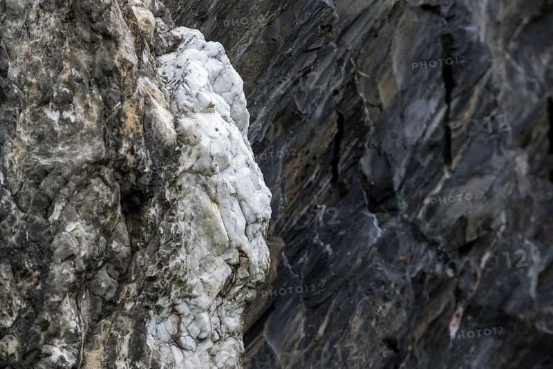 White quartz vein in rock face at Ballachulish shale quarry in Lochaber