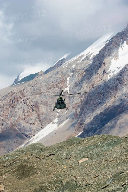 Helicopter landing at Khan Tengri Base Camp