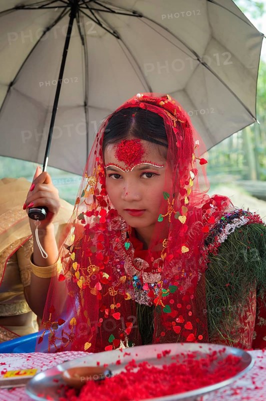 Nepalese bride from the Tharu ethnic group in traditional dress