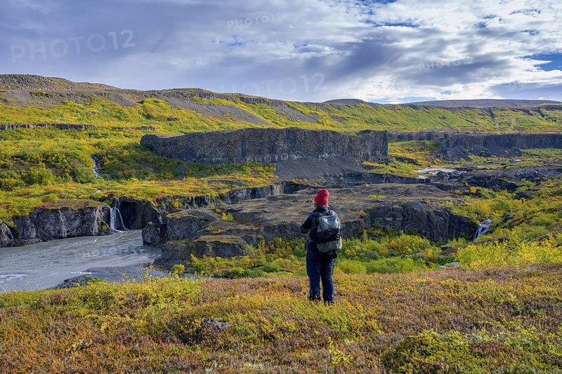 Woman looking towards the Katlar narrows of Joekulsa A Fjoellum
