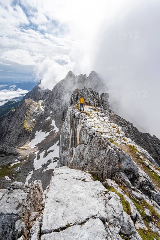 Hiker at the summit of the Westliche Toerlspitze