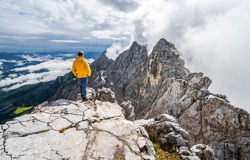 Hiker at the summit of the Westliche Toerlspitze