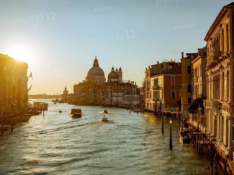 Boats in the Grand Canal at sunrise