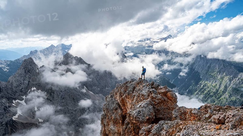 Hiker standing on a rock
