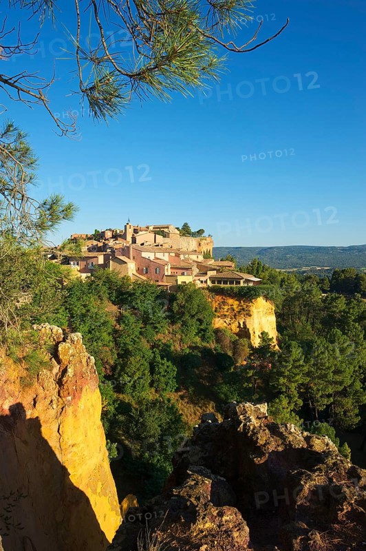 Ochre rocks with the old town of Roussillon