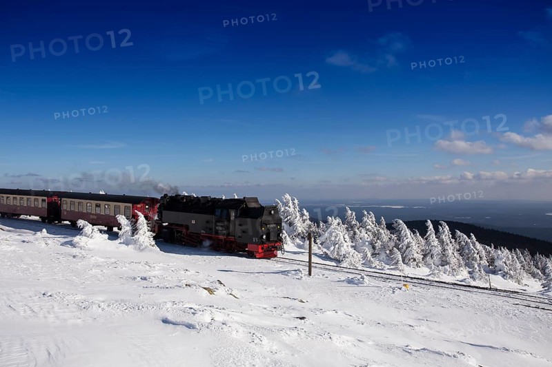 Narrow-gauge railway Brockenbahn on summit in front of Brocken station