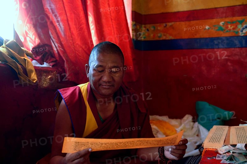 Monk in the prayer room