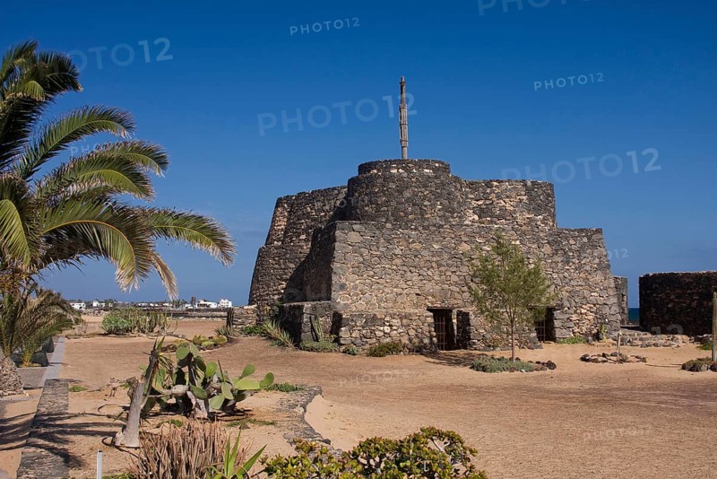 Old fortress on the beach promenade of Caleta de Fuste