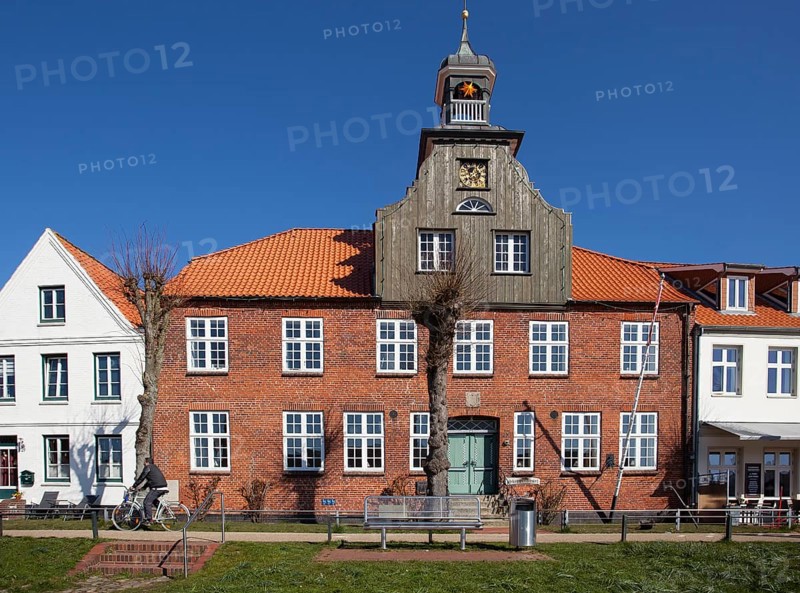 Old historic half-timbered house at the old historic harbour of Toenning