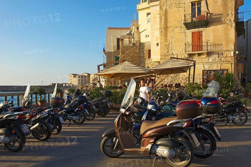 Vespas on the outskirts of the old town of Cefalu