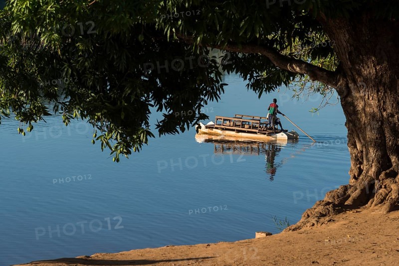 Passenger ferry at Manambolo under mango tree