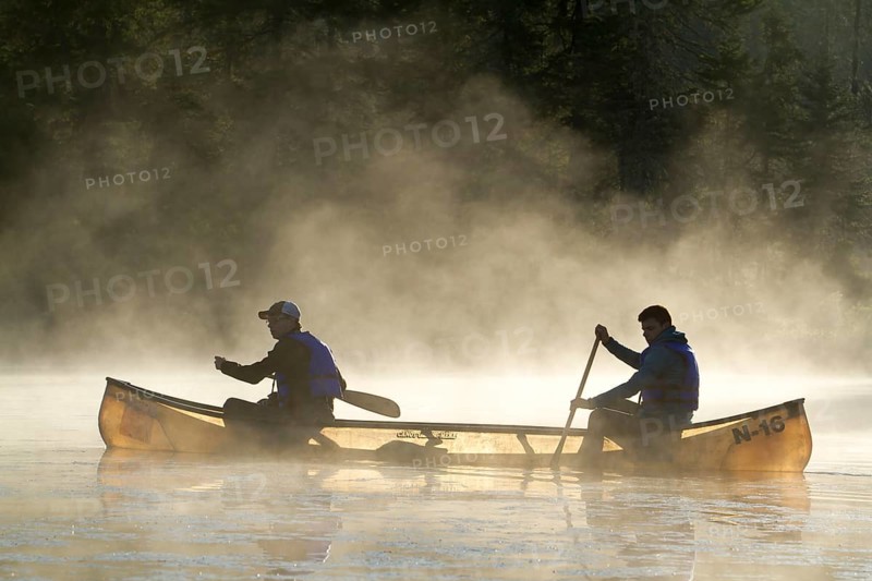 Canoeing in the morning mist