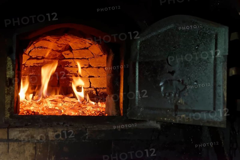 Heat up a stone oven