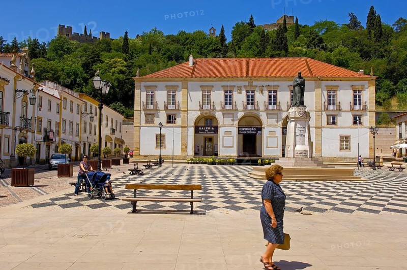 Town Hall in praca da Reublica and Templar Castle of Christ in the background