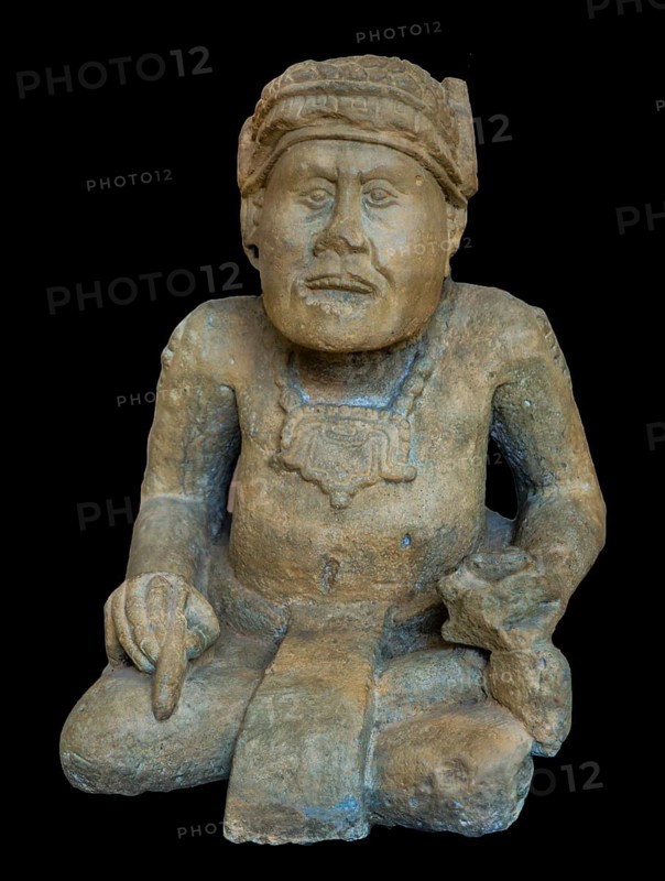 Seated statue in lotus position with incense bowl
