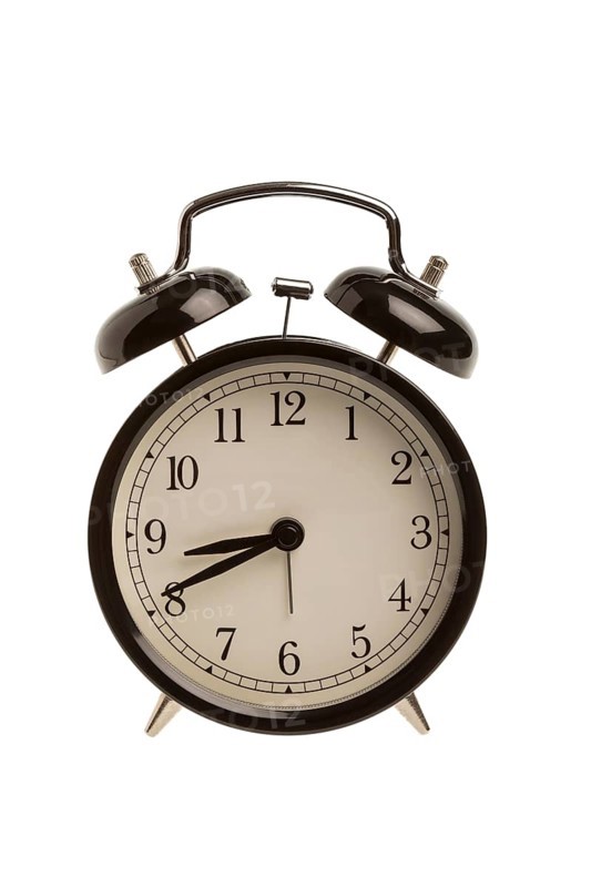 Alarm clock on white background