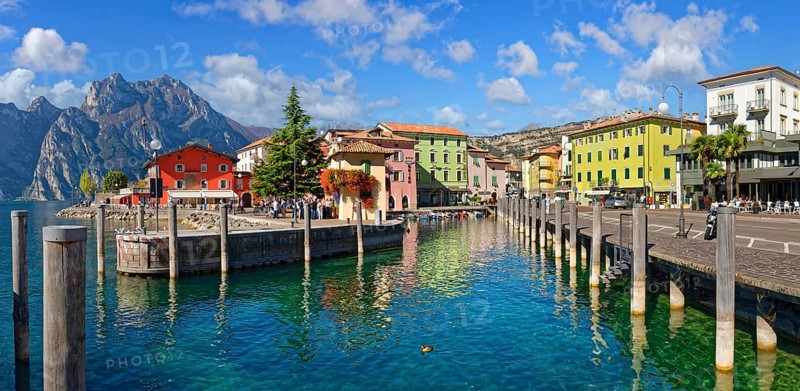 Old coastal town with small harbour and colourful houses