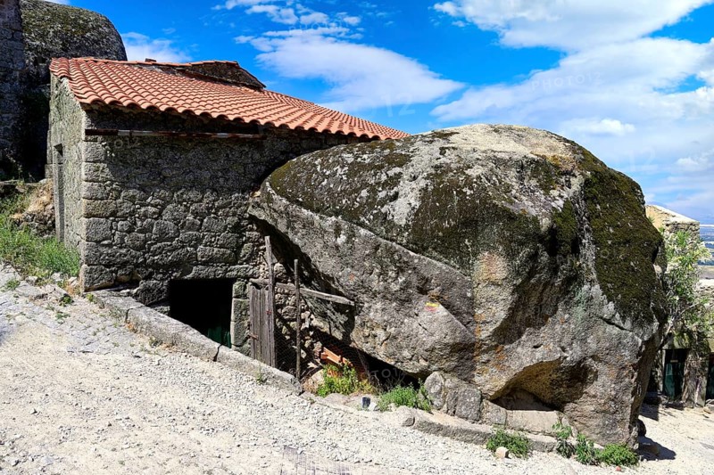 Old stone houses between rocks