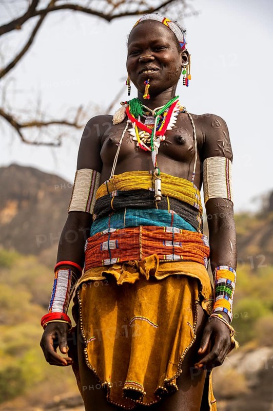Traditional dressed young girl from the Laarim tribe