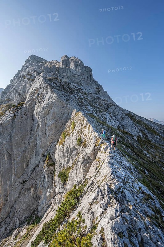Hikers on a Grade