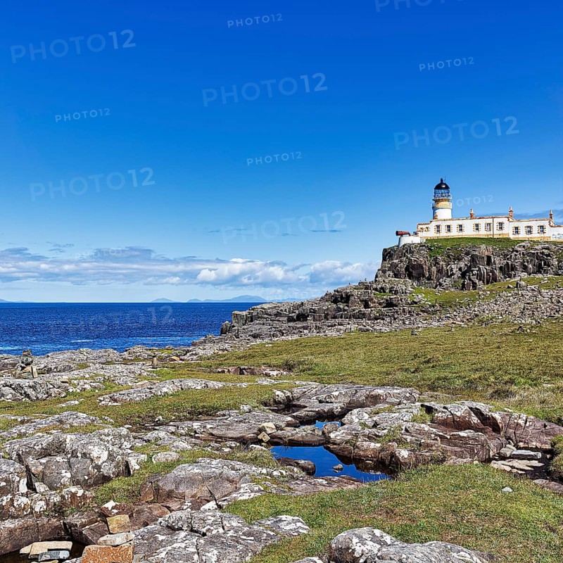 Lighthouse on rocky coast
