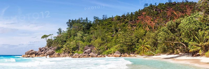 Anse Georgette Beach on Praslin Island with Palm Panorama Sea in the Seychelles