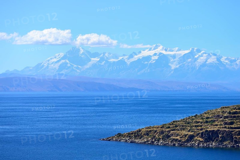 View across the lake to the Cordillera Real mountain range