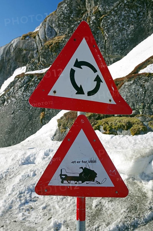Traffic sign with roundabout and snowmobile
