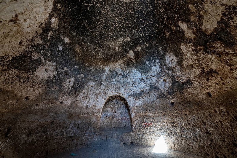 Cave system in the Takht-e Rostam stupa monastery complex