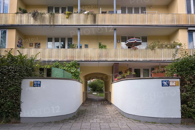Balconies with plants and parasol