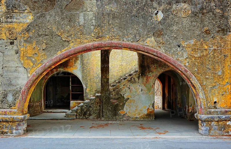 Entrance of a dilapidated arcaded building