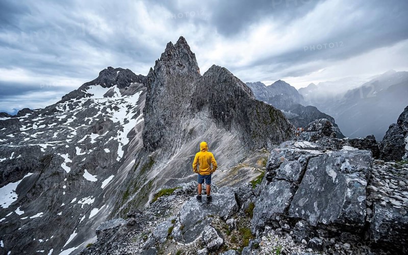 Hiker at the summit of the Westliche Toerlspitze