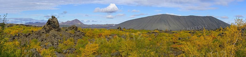 Tuff ring Hverfjall and lava formation of Dimmuborgir with autumn coloured birch vegetation