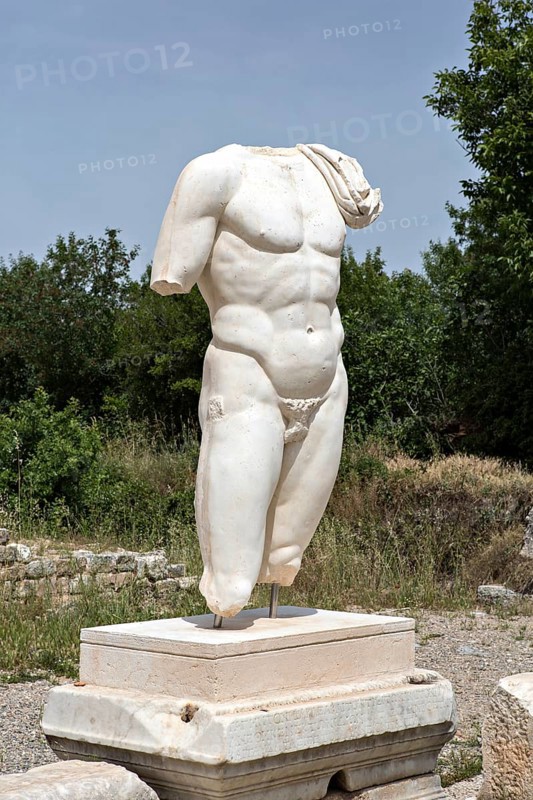 Collosal torso of a naked male god in the Hadrian's Bath of Aphrodisias in Aydin