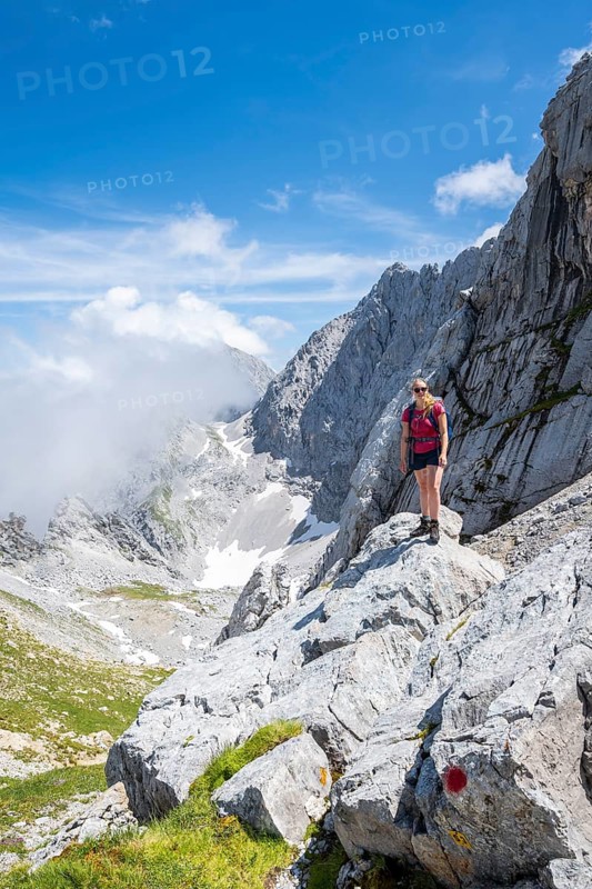 Hiker standing on a rock