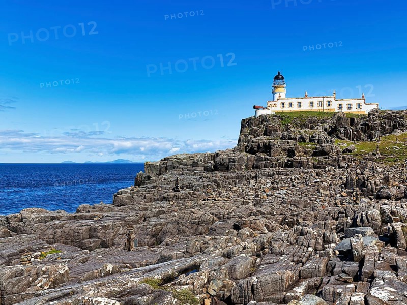 Lighthouse on rocky coast