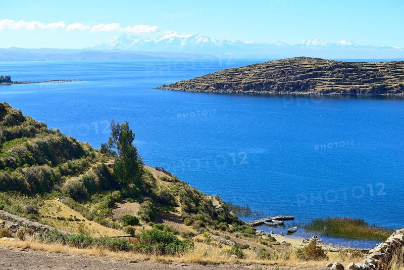 View across the lake to the Cordillera Real mountain range