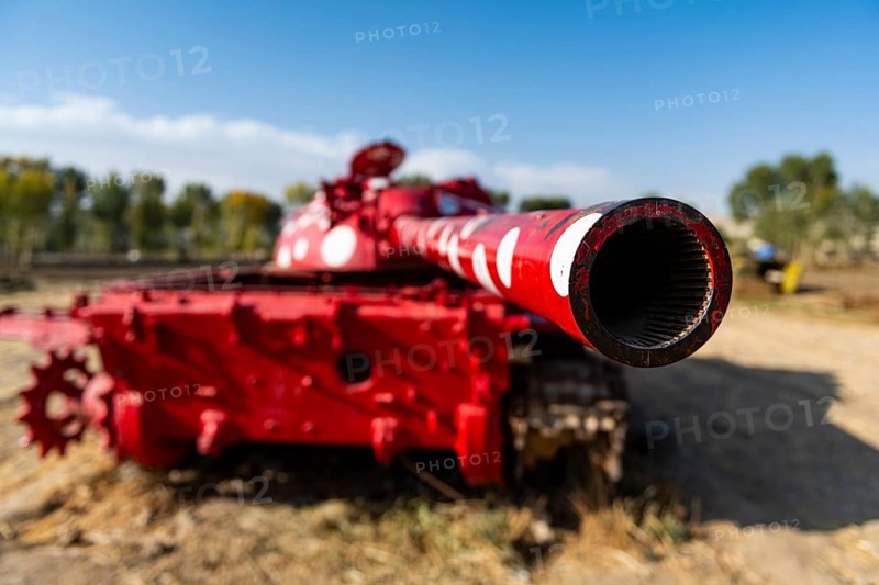 Old soviet tank coloured in funky colours