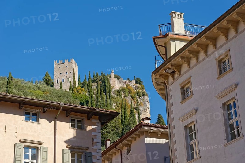 View from Piazza Novembre to the medieval castle ruins Castello di Arco