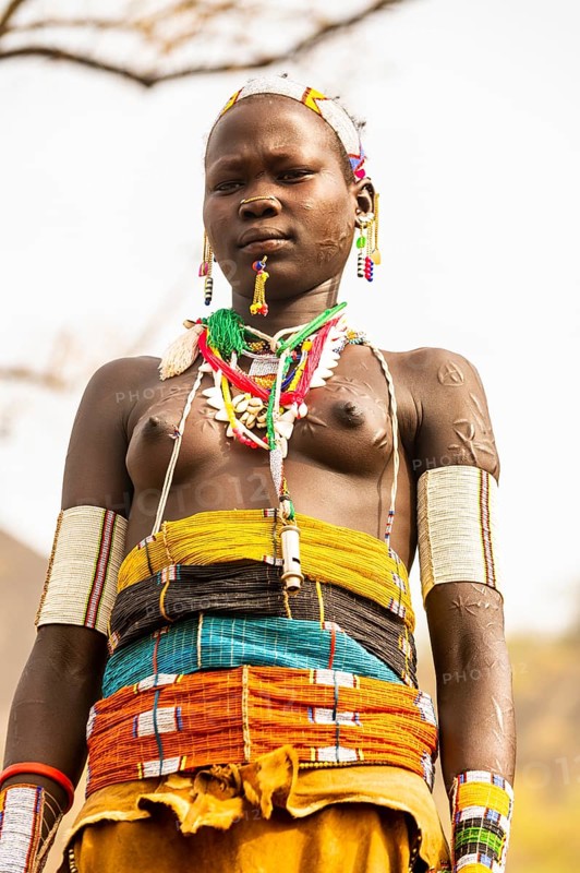 Traditional dressed young girl from the Laarim tribe
