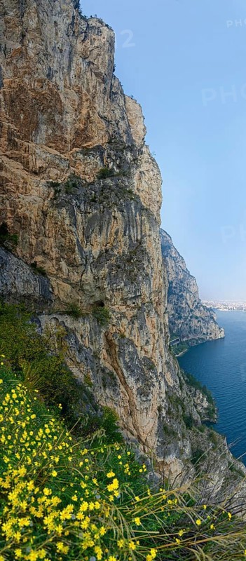 Steep wall of the old coastal road and hiking trail Via Ponale