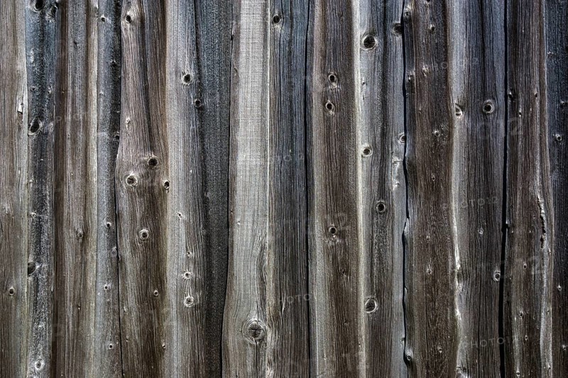 Old wooden boards as a wall of a barn